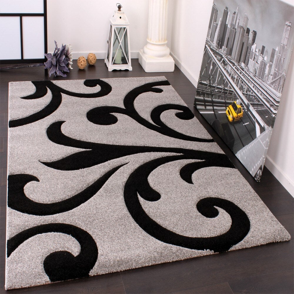 Tapis moderne à motif floral avec contour découpé