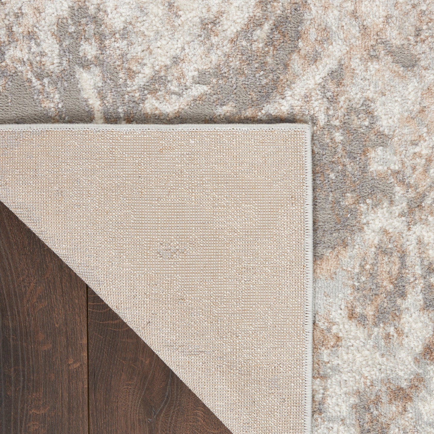 Tapis moderne abstrait gris ivoire Nourison Elation