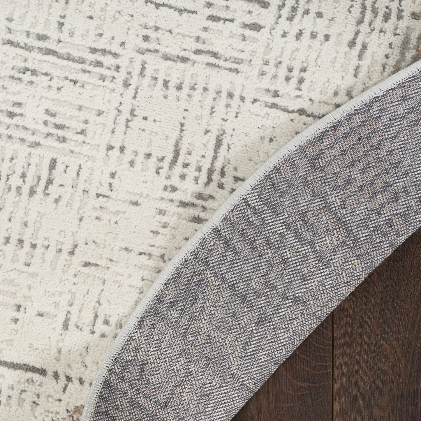 Tapis abstrait gris ivoire Nourison Emily pour l'intérieur uniquement