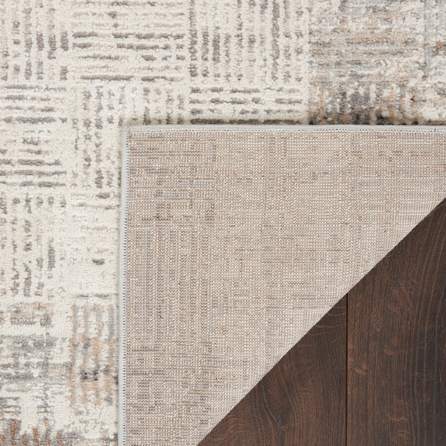 Tapis abstrait gris ivoire Nourison Emily pour l'intérieur uniquement