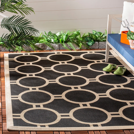 Tapis de jardin imperméable d'intérieur/extérieur SAFAVIEH Courtyard Nira