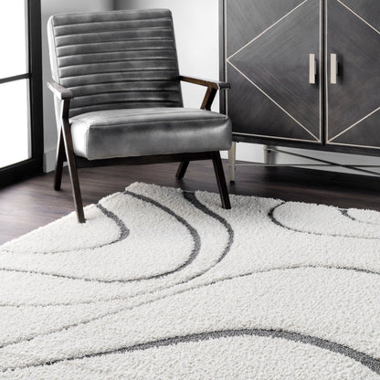 Tapis Shag contemporain Nuloom Krista à motifs tourbillonnants