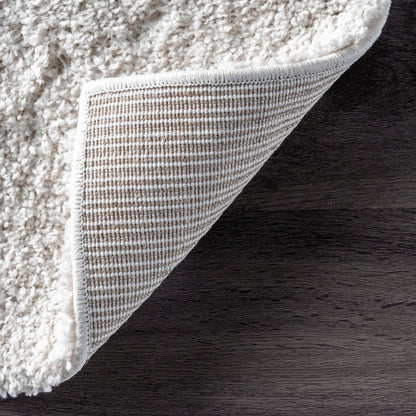 Tapis Shag contemporain Nuloom Krista à motifs tourbillonnants