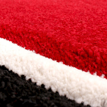 Tapis design avec contour découpé et motif ondulé moderne