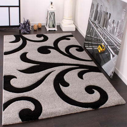 Tapis moderne à motif floral avec contour découpé