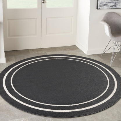 Tapis uni d'intérieur/extérieur Nourison Essentials