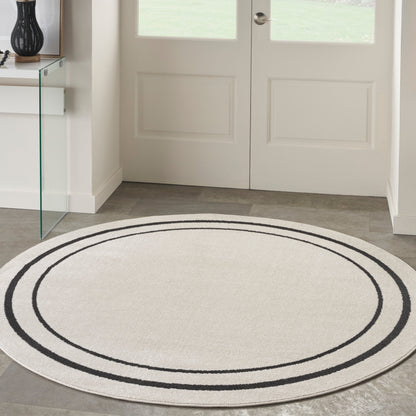 Tapis uni d'intérieur/extérieur Nourison Essentials
