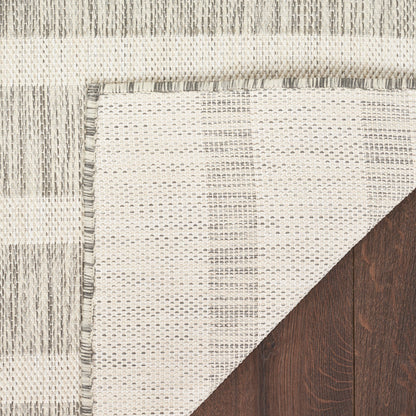 Tapis rayé intérieur/extérieur Nourison Selerno.