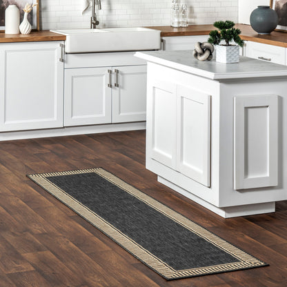 Tapis d'intérieur/extérieur classique à bordures Nuloom Leah