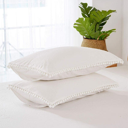 Parure de lit réversible en coton à pompons