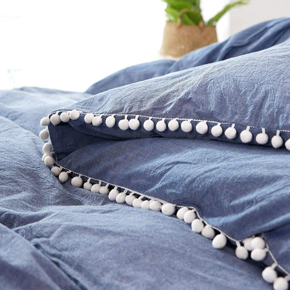 Parure de lit réversible en coton à pompons