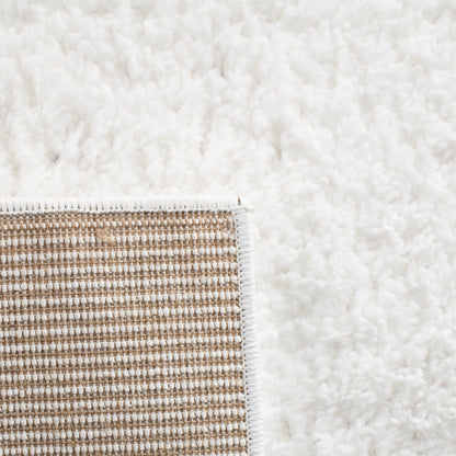 Tapis SAFAVIEH August Wilhelma Shag uni de 3 cm d'épaisseur