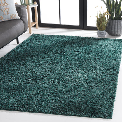 Tapis SAFAVIEH August Wilhelma Shag uni de 3 cm d'épaisseur