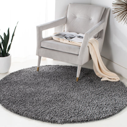 Tapis SAFAVIEH August Wilhelma Shag uni de 3 cm d'épaisseur