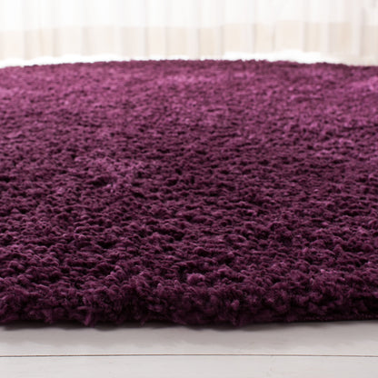 Tapis SAFAVIEH August Wilhelma Shag uni de 3 cm d'épaisseur