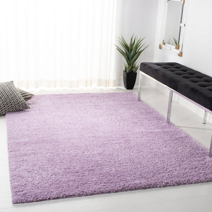 Tapis SAFAVIEH August Wilhelma Shag uni de 3 cm d'épaisseur