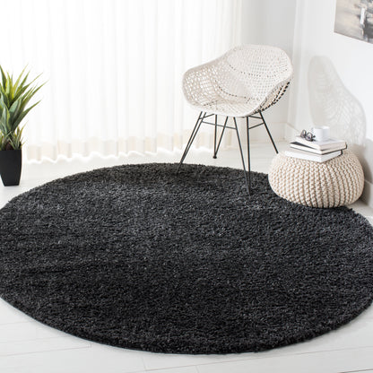 Tapis SAFAVIEH August Wilhelma Shag uni de 3 cm d'épaisseur