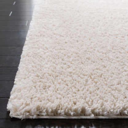 Tapis SAFAVIEH August Wilhelma Shag uni de 3 cm d'épaisseur