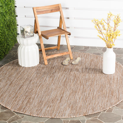 Tapis de patio/jardin imperméable SAFAVIEH Courtyard Begajeta pour intérieur/extérieur.