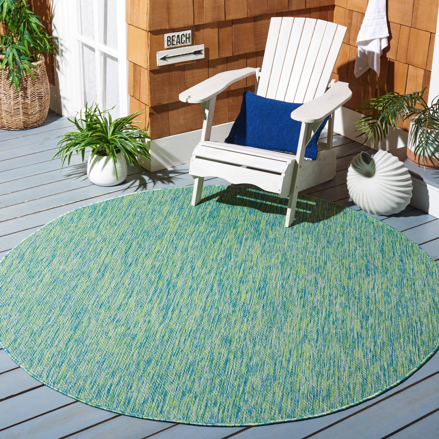 Tapis de patio/jardin imperméable SAFAVIEH Courtyard Begajeta pour intérieur/extérieur.