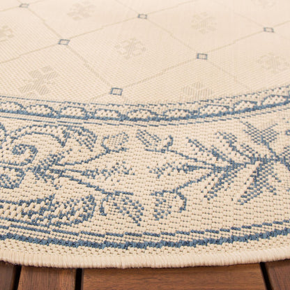 Tapis de jardin imperméable pour intérieur/extérieur SAFAVIEH Courtyard Hendrina