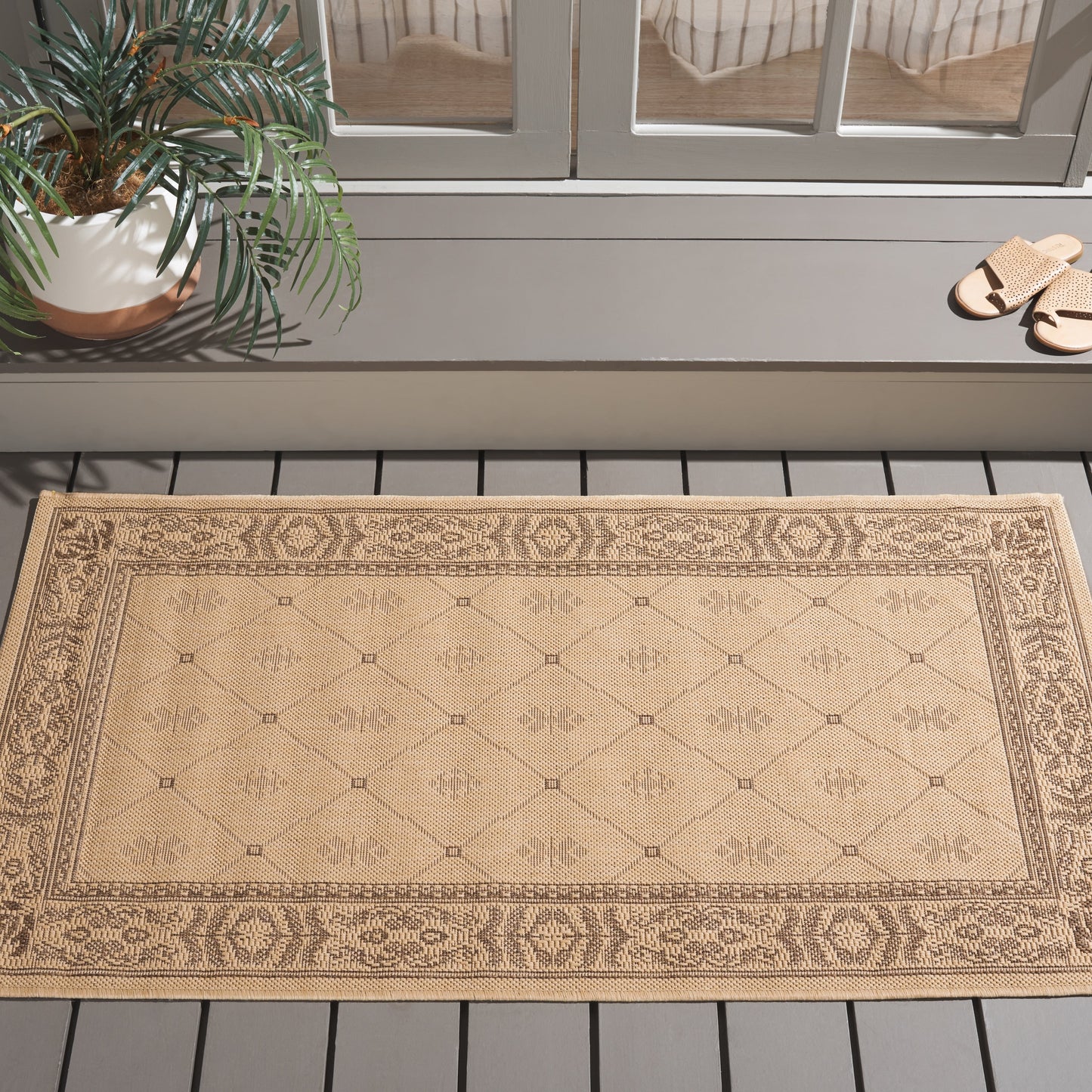 Tapis de jardin imperméable pour intérieur/extérieur SAFAVIEH Courtyard Hendrina
