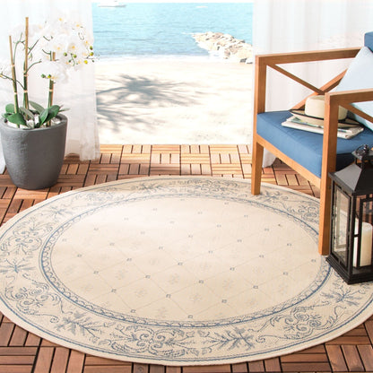 Tapis de jardin imperméable pour intérieur/extérieur SAFAVIEH Courtyard Hendrina