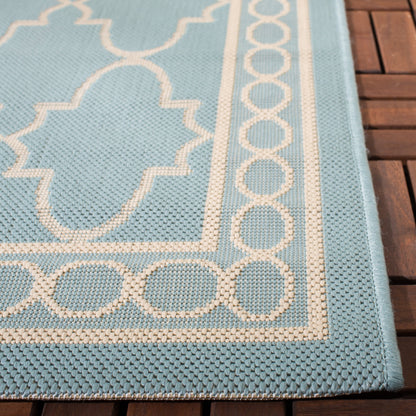 Tapis de jardin imperméable pour intérieur/extérieur SAFAVIEH Courtyard Janell Treillis