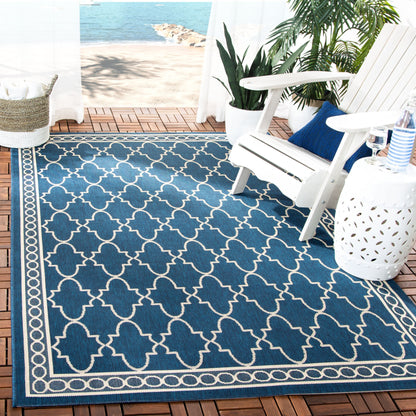 Tapis de jardin imperméable pour intérieur/extérieur SAFAVIEH Courtyard Janell Treillis