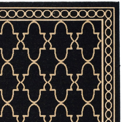 Tapis de jardin imperméable pour intérieur/extérieur SAFAVIEH Courtyard Janell Treillis