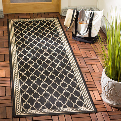 Tapis de jardin imperméable pour intérieur/extérieur SAFAVIEH Courtyard Janell Treillis