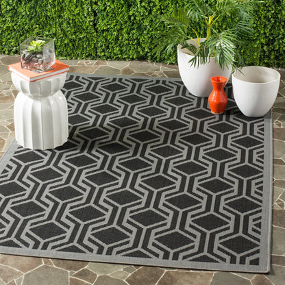 Tapis de jardin imperméable pour intérieur/extérieur SAFAVIEH Courtyard Jeanine