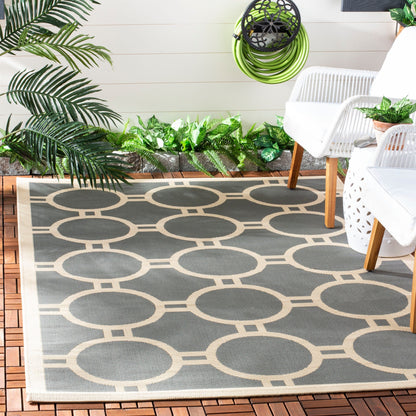 Tapis de jardin imperméable d'intérieur/extérieur SAFAVIEH Courtyard Nira