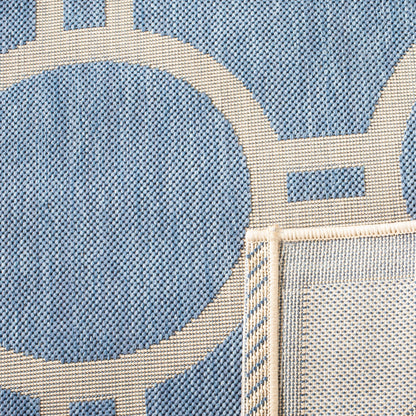 Tapis de jardin imperméable d'intérieur/extérieur SAFAVIEH Courtyard Nira