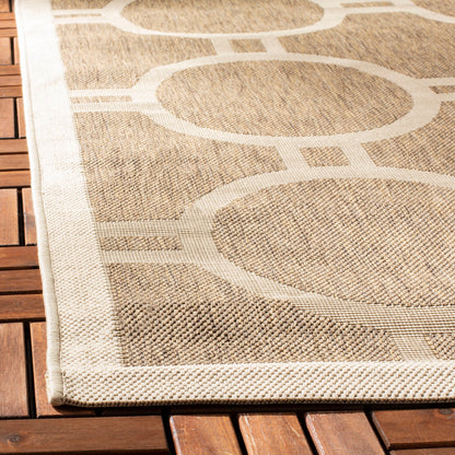 Tapis de jardin imperméable d'intérieur/extérieur SAFAVIEH Courtyard Nira