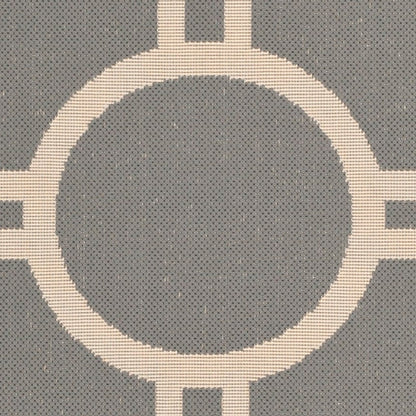 Tapis de jardin imperméable d'intérieur/extérieur SAFAVIEH Courtyard Nira