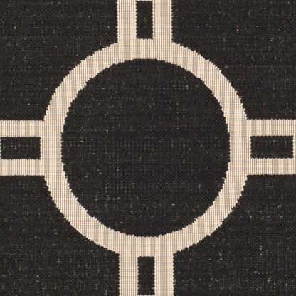 Tapis de jardin imperméable d'intérieur/extérieur SAFAVIEH Courtyard Nira