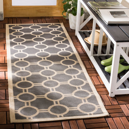 Tapis de jardin imperméable d'intérieur/extérieur SAFAVIEH Courtyard Nira