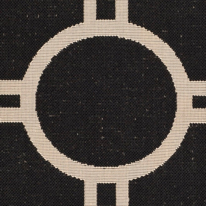 Tapis de jardin imperméable d'intérieur/extérieur SAFAVIEH Courtyard Nira