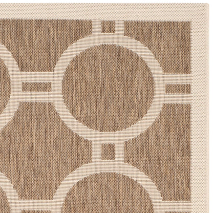 Tapis de jardin imperméable d'intérieur/extérieur SAFAVIEH Courtyard Nira