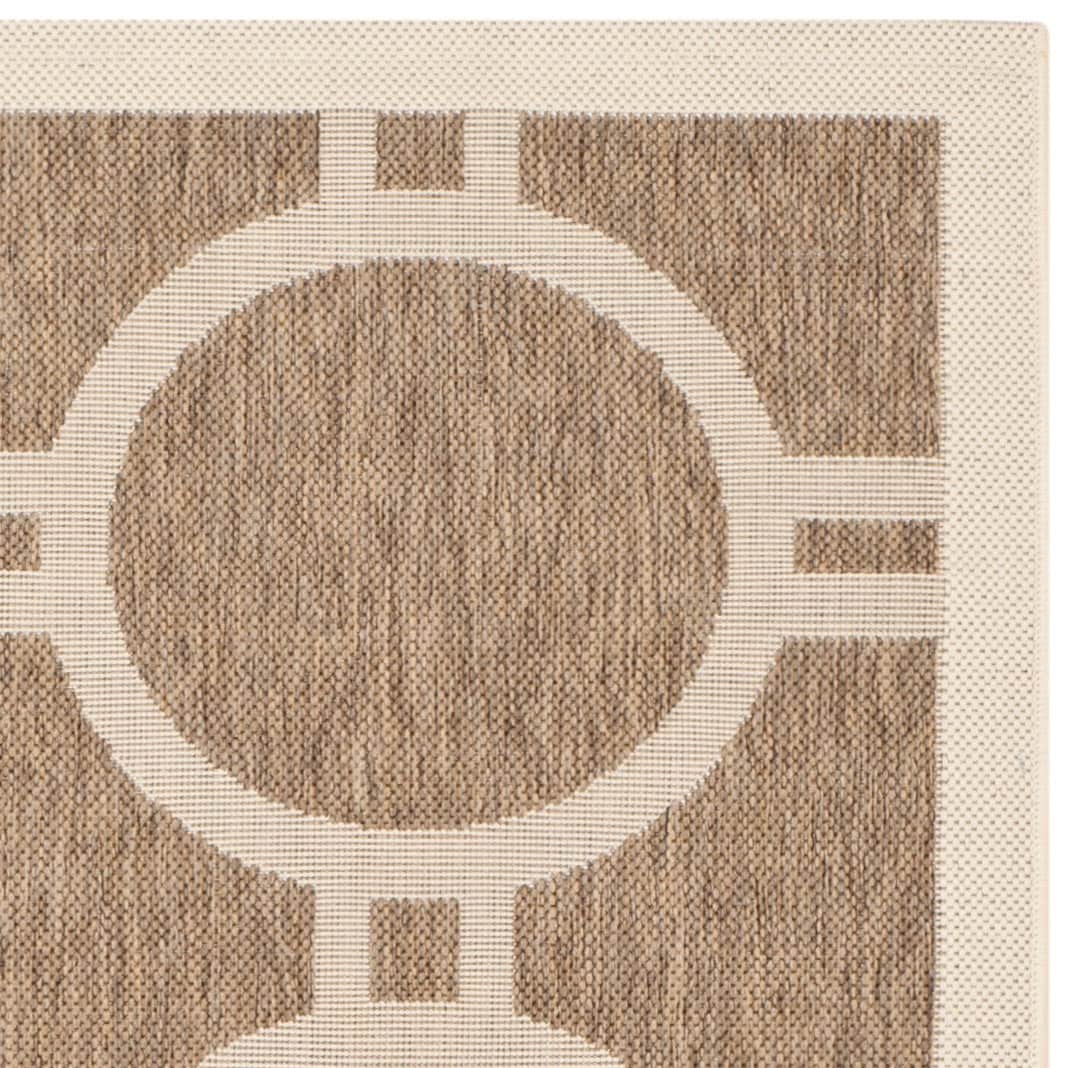 Tapis de jardin imperméable d'intérieur/extérieur SAFAVIEH Courtyard Nira