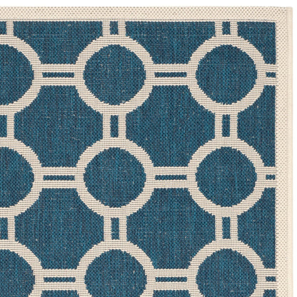 Tapis de jardin imperméable d'intérieur/extérieur SAFAVIEH Courtyard Nira