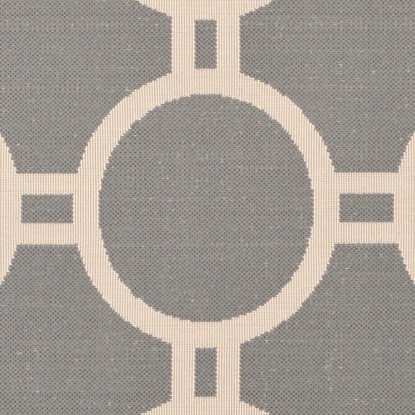 Tapis de jardin imperméable d'intérieur/extérieur SAFAVIEH Courtyard Nira