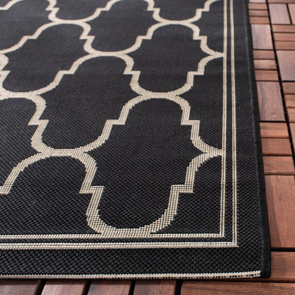 Tapis de patio imperméable en treillis SAFAVIEH Courtyard Sufia