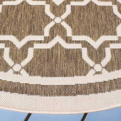 Tapis de jardin imperméable d'intérieur/extérieur SAFAVIEH Courtyard Thomasina