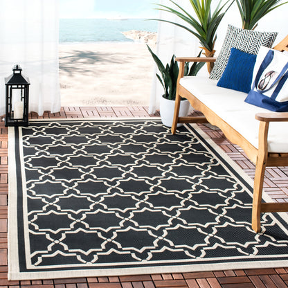 Tapis de jardin imperméable d'intérieur/extérieur SAFAVIEH Courtyard Thomasina