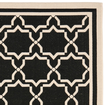 Tapis de jardin imperméable d'intérieur/extérieur SAFAVIEH Courtyard Thomasina