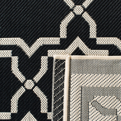 Tapis de jardin imperméable d'intérieur/extérieur SAFAVIEH Courtyard Thomasina