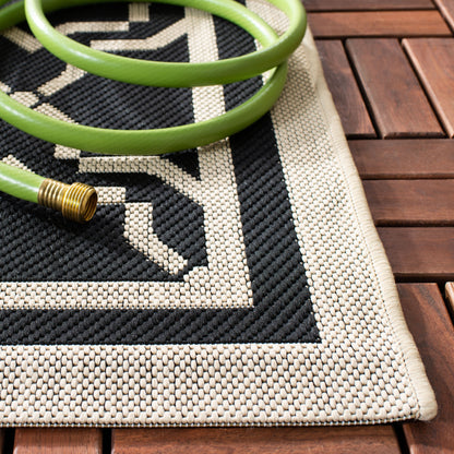 Tapis de jardin imperméable d'intérieur/extérieur SAFAVIEH Courtyard Thomasina