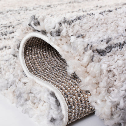 Tapis moderne à rayures SAFAVIEH Fontana Shag Mevlide de 2 pouces d'épaisseur